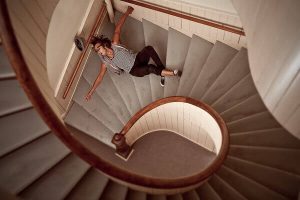 Woman fallen on staircase